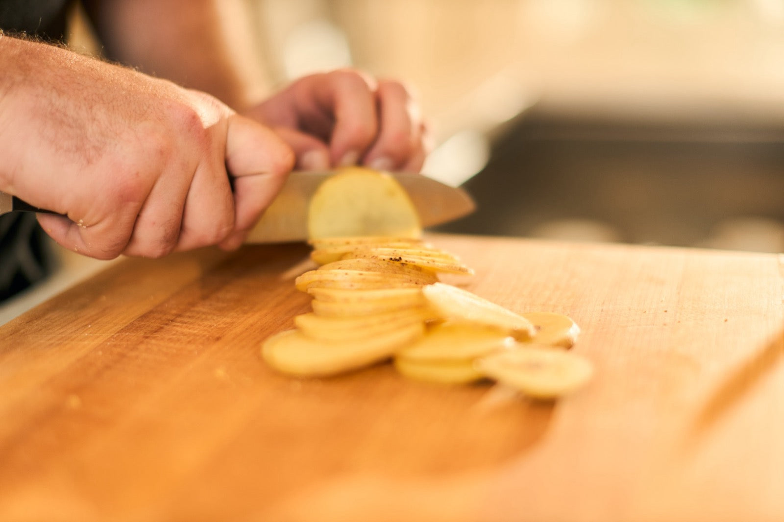 Potatoes being sliced for Teddy's chips